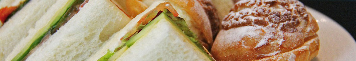 Eating Sandwich at TopZ Sandwich Company restaurant in Billings, MT.